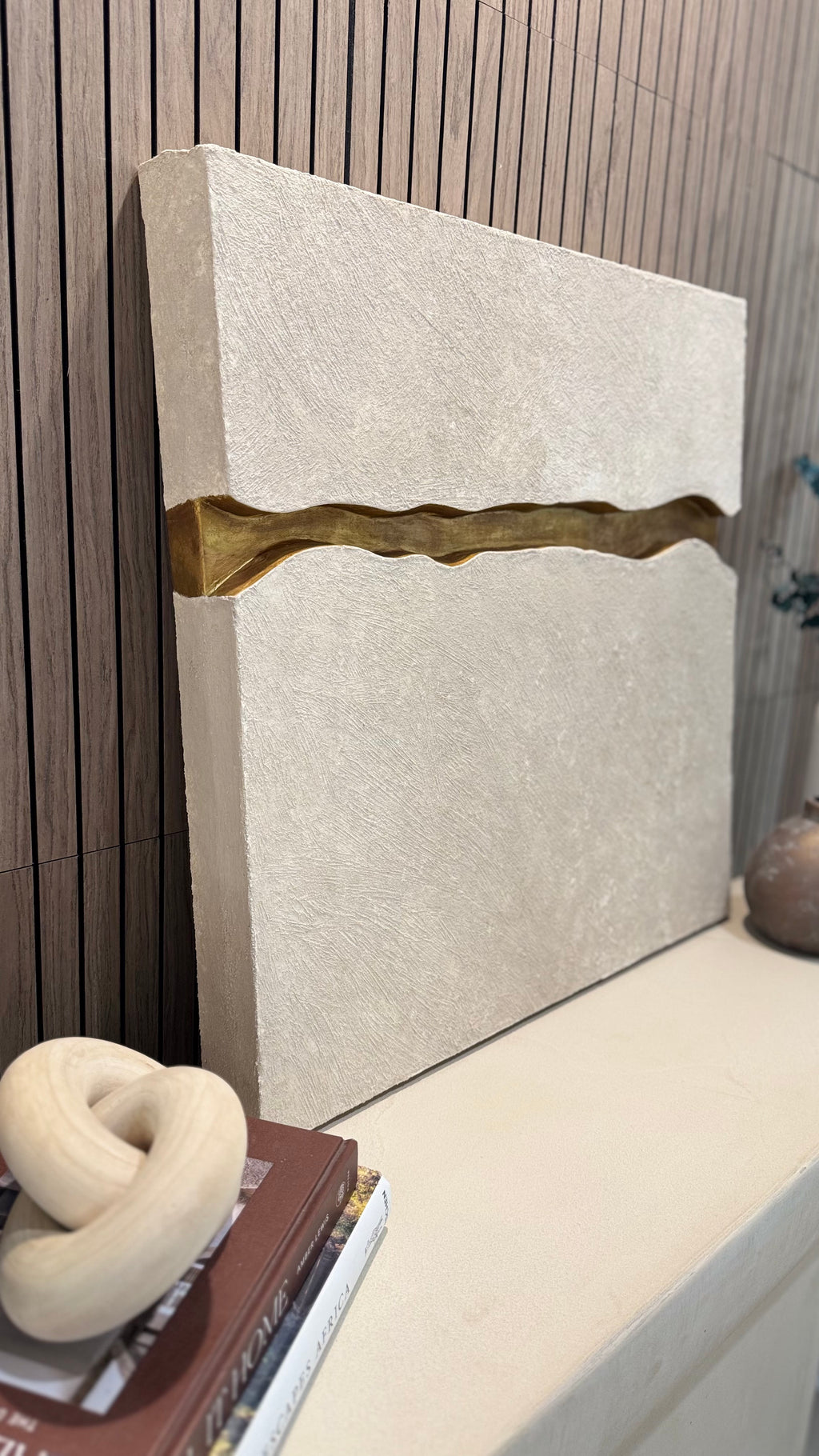 KR 01 Canyon I, detail view — two stone-like planes framing an abstract canyon with a metallic reveal | ACAYA Studio Kruger collection