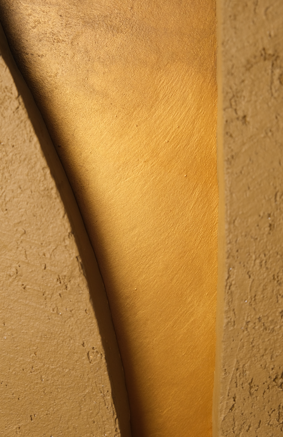 KR 02 Kloof, styled in room — sculpted mineral surfaces parting to reveal a warm metallic passage | ACAYA Studio Kruger collection