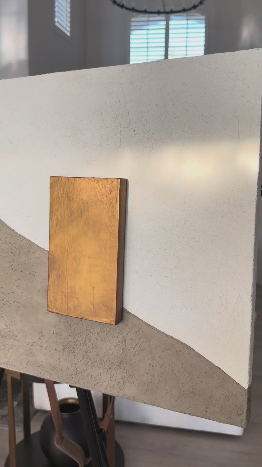 KR 05 Drought handmade plaster wall art, video showing texture and the raised bronze-and-gold block | ACAYA Studio